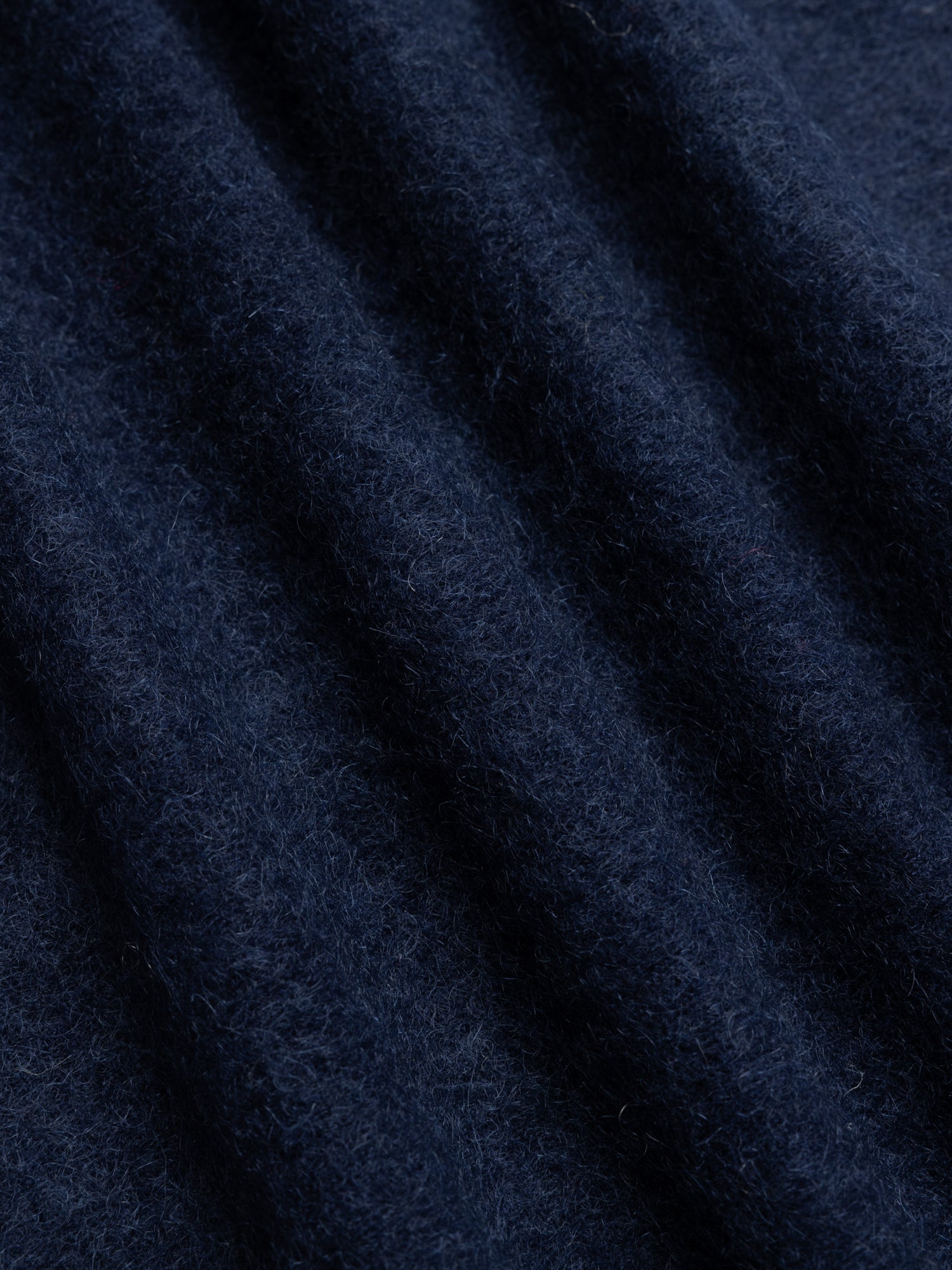 Close-up of dark blue fabric texture