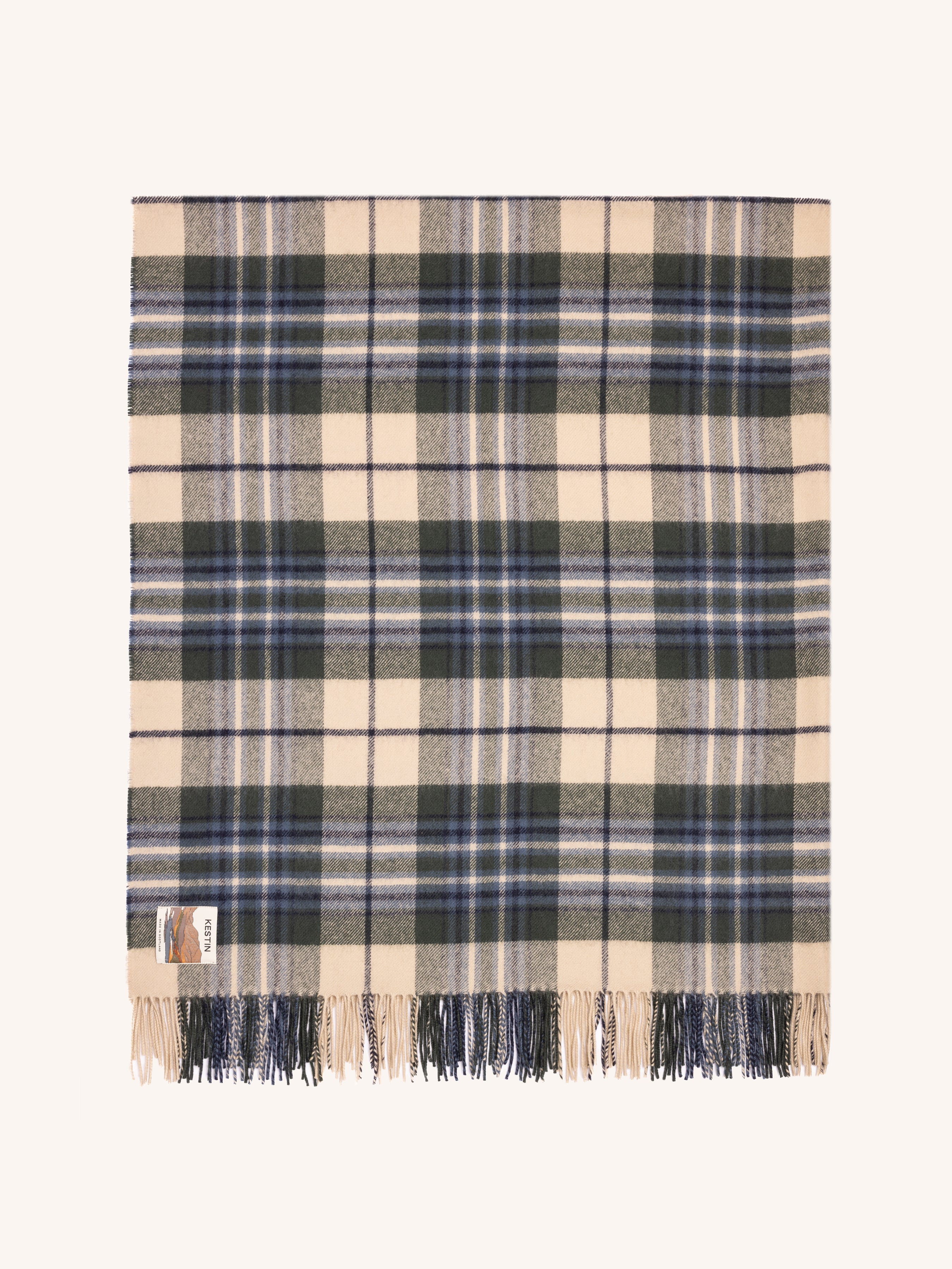 Plaid blanket with blue and beige colors on a white background
