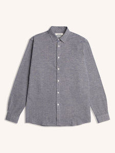 A classic men's long sleeve shirt in blue slub, on a white background.