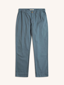 A pair of men's workwear trousers in blue, on a white background.