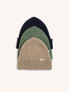 Three knitted beanies, made in Scotland from a premium wool by KESTIN.