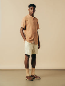 A man wearing a spring outfit, designed by Scottish brand KESTIN.