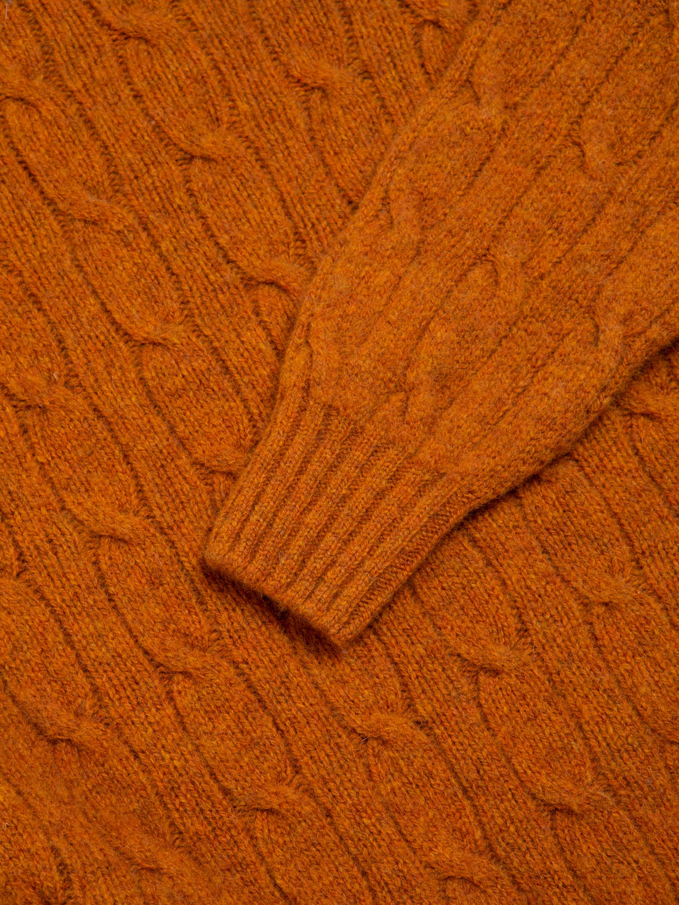 The ribbed cuff and cable knit material used to make the KESTIN Galloway Sweater.