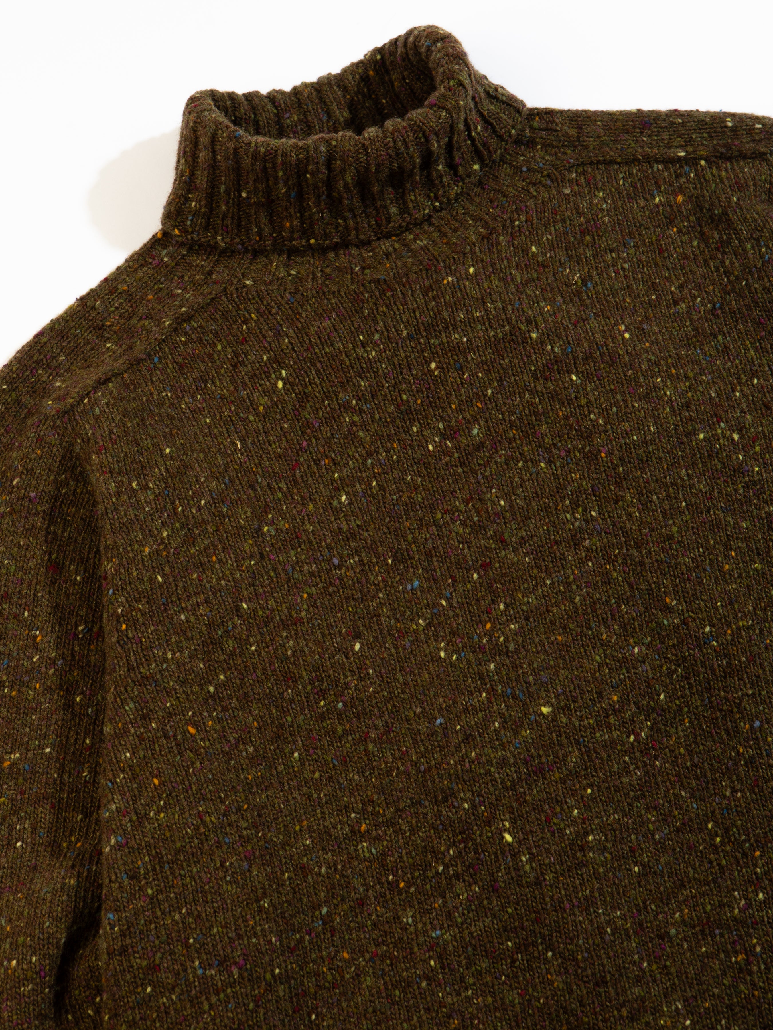 A Donegal wool sweater from Scottish menswear brand KESTIN, with a ribbed roll neck.