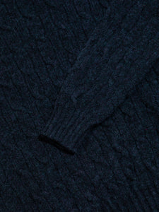 Brushed Shetland Wool, dyed in Airforce Blue and spun into a Cable Knit.