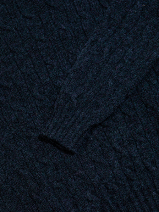 Brushed Shetland Wool, dyed in Airforce Blue and spun into a Cable Knit.