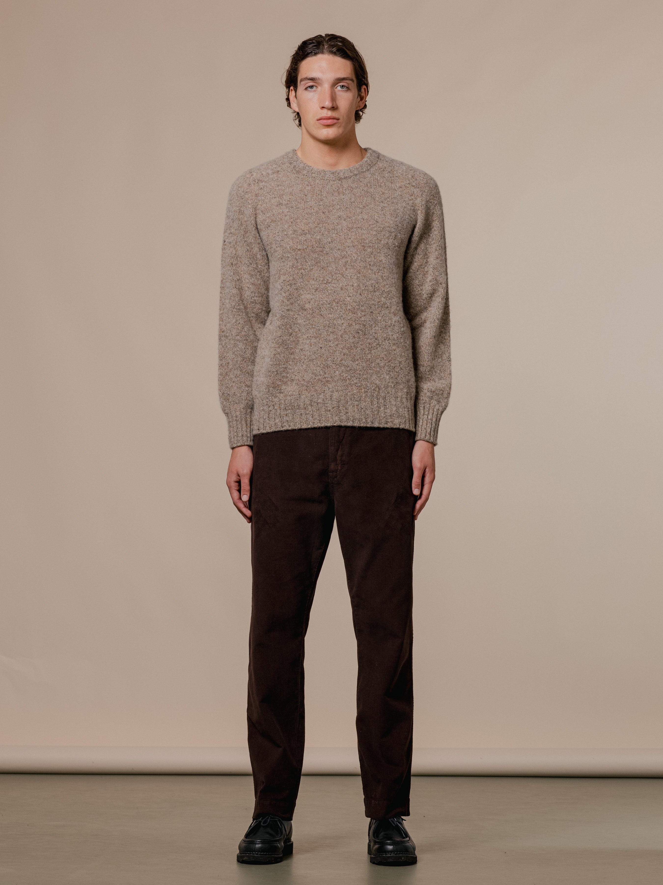 A model wearing a brushed Shetland wool sweater by Scottish brand KESTIN.