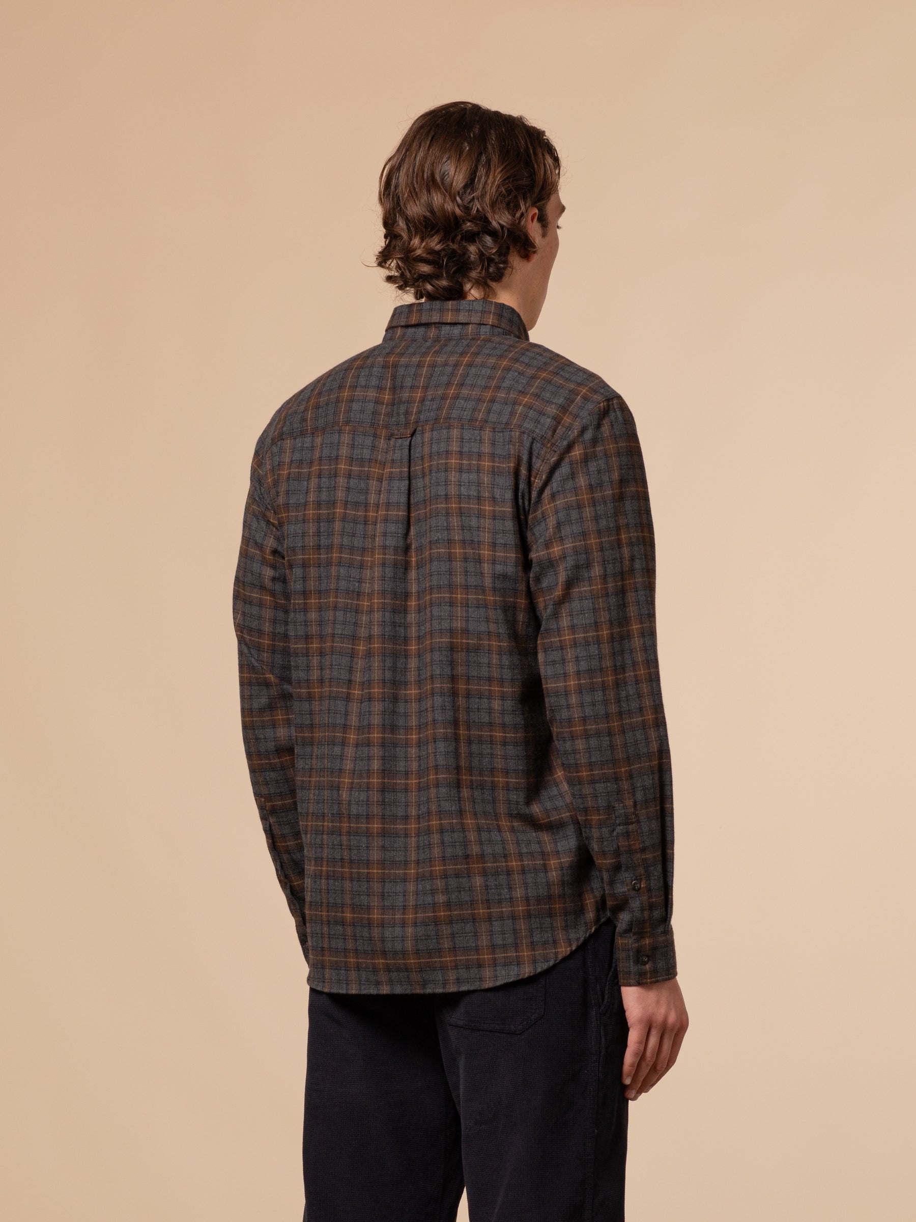 The back profile of the KESTIN Raeburn Button Down Shirt in a Grey/Brown plaid check.