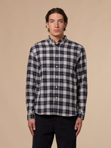 A model wearing the Raeburn Shirt by British menswear brand KESTIN.