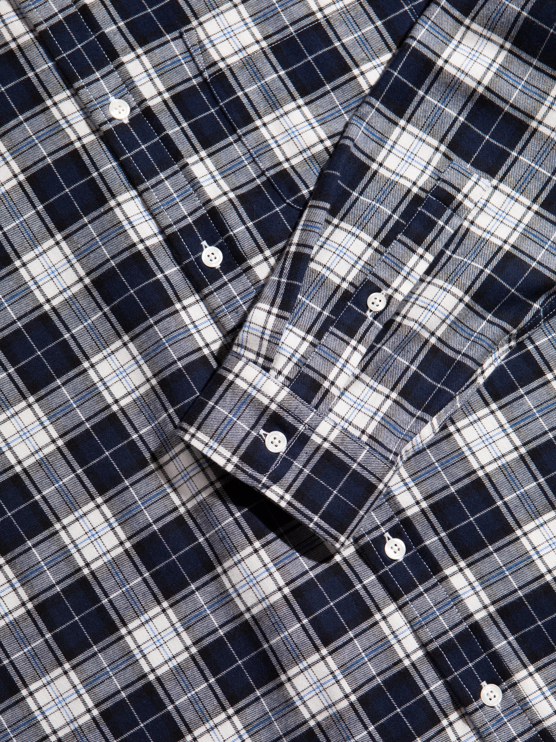 A check flannel shirt by British menswear brand KESTIN.