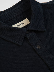 A close-up of the collar of the KESTIN Dirleton Shirt in navy blue.