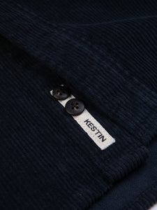 A woven logo tag from Scottish menswear brand KESTIN.