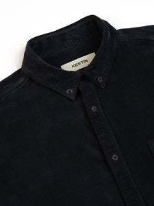 A close-up of the collar of the KESTIN Raeburn Shirt in a dark navy fabric.