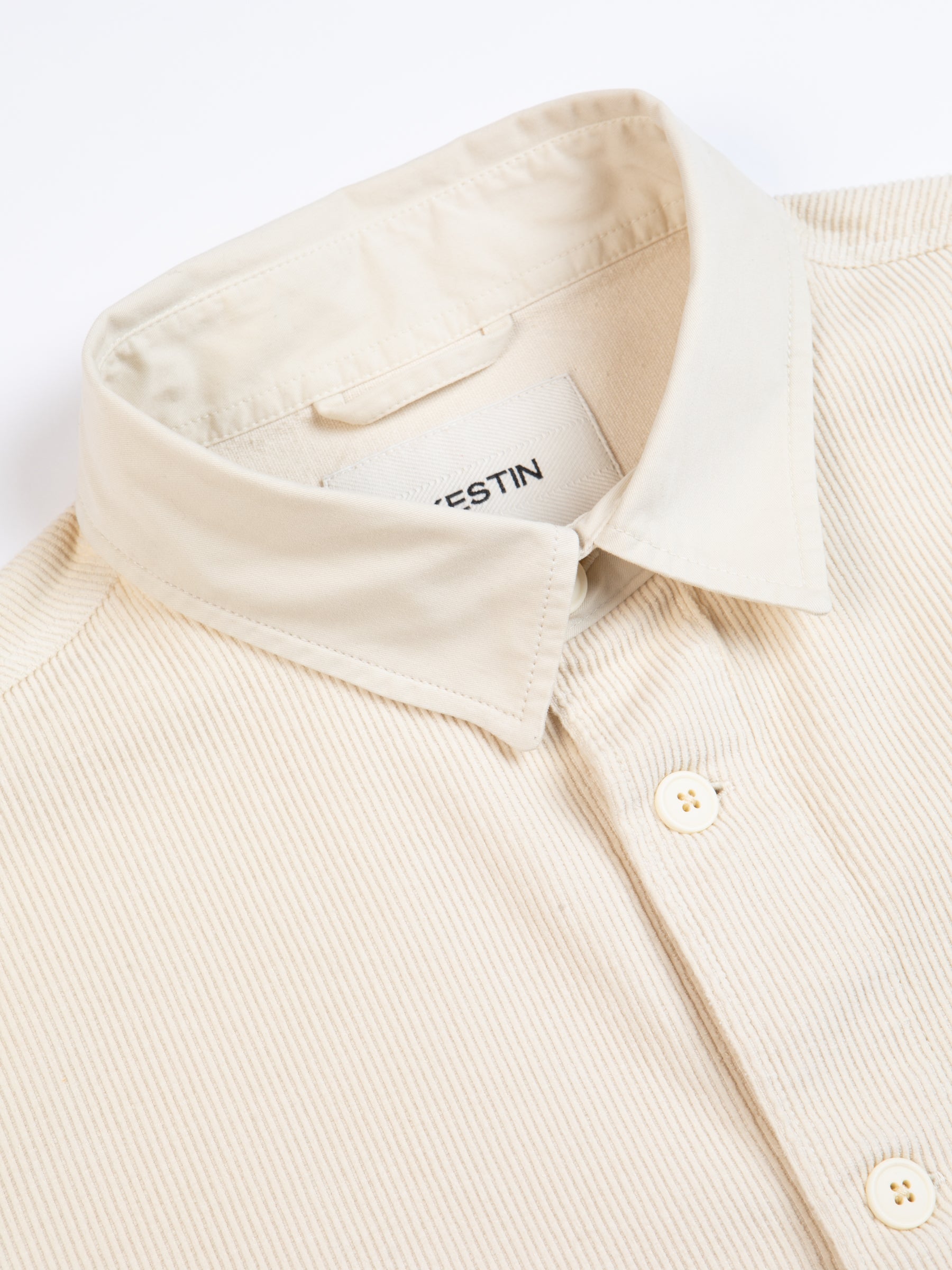 The collar of the KESTIN Rosyth Overshirt in ecru.