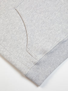 The ribbed hem and kangaroo pocket from a hoodie by menswear label KESTIN.