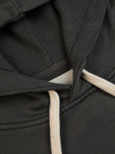 The drawstring hood and waffle-lining of the KESTIN St Andrews Hoodie.