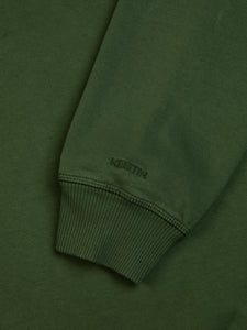 A garment dyed green sweatshirt with a logo embroidered to the ribbed cuff.