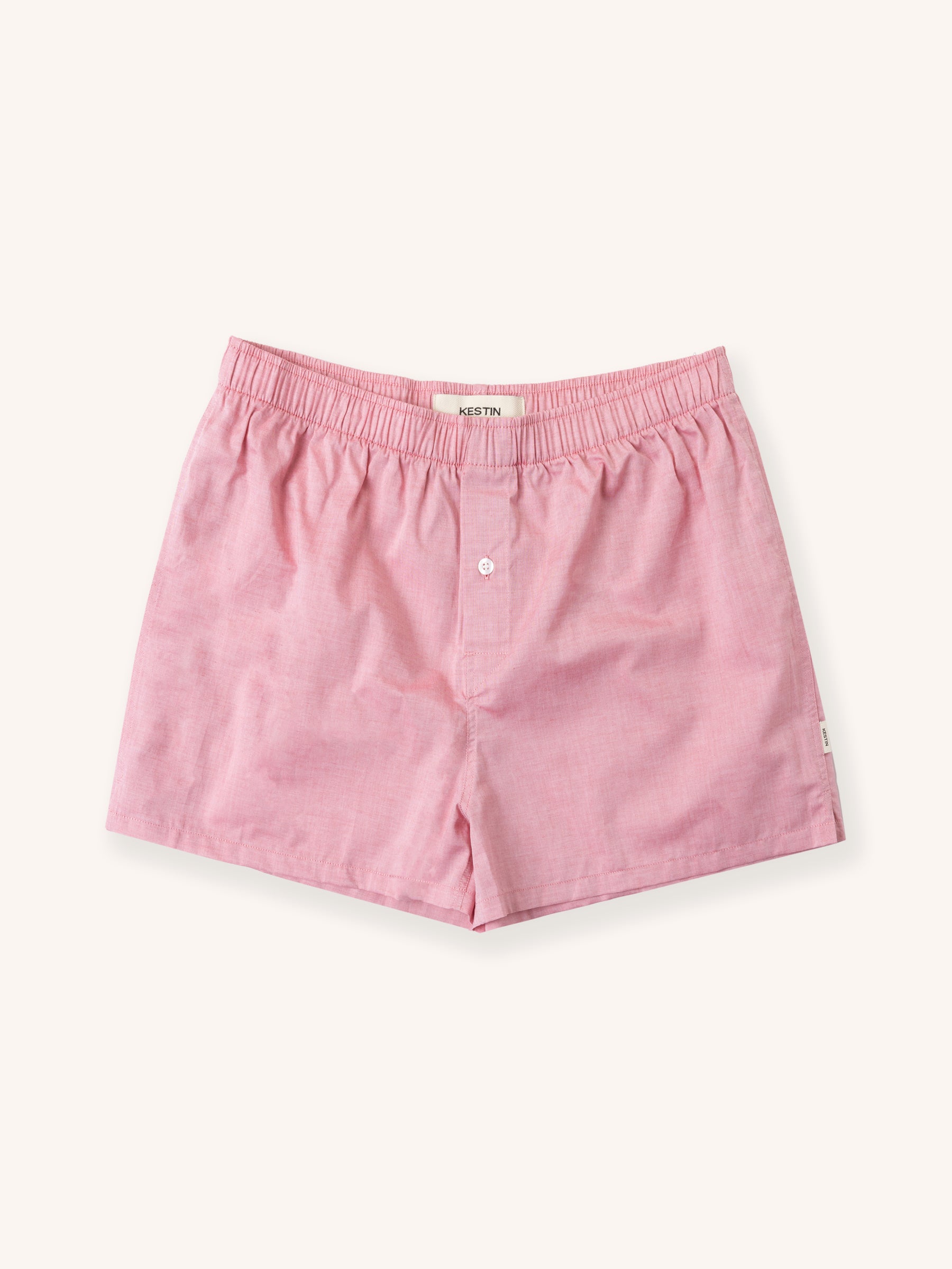 Pink men's boxer shorts on a white background