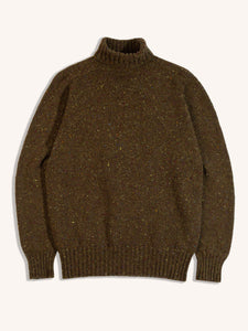 A knitted roll neck sweater from menswear brand KESTIN made from Donegal wool.