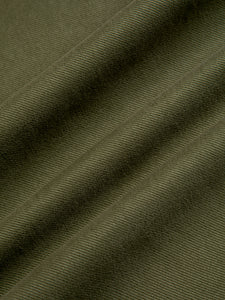 An olive green twill fabric used to make the KESTIN Doune Pant.