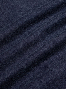 A lightweight indigo denim material from KESTIN, used for the Rosyth Overshirt.