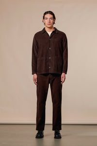 A model wearing the Huntly Jacket and Pants from Scottish menswear designer KESTIN.