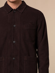 A waffle corduroy material in dark brown, used to make the Huntly Jacket by KESTIN.