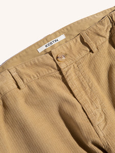 The fly of the Huntly Pants by KESTIN, made from a tan waffle corduroy material.