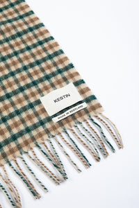 A brushed lambswool scarf from KESTIN with a woven logo patch.