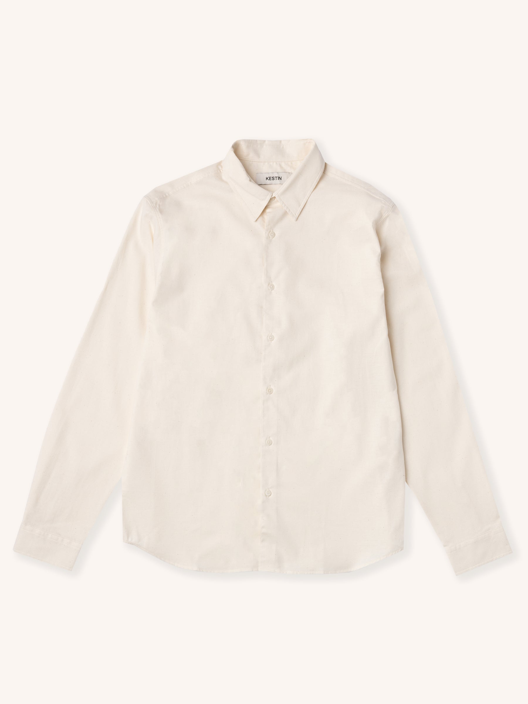 Lightweight men's beige shirt on a white background.