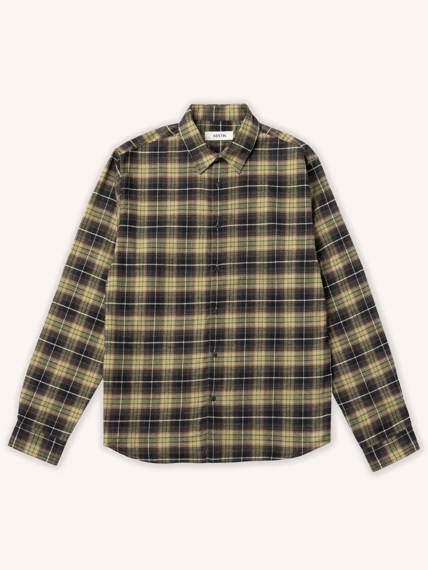 Plaid shirt with green and brown pattern on a white background