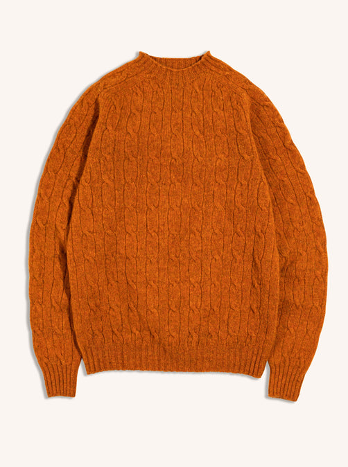 The KESTIN Men's Galloway Cable Knit Sweater in Tangerine, on a white background.