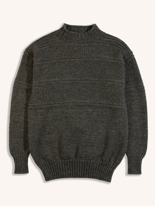 A men's knitted sweater from KESTIN in a charcoal grey colour on a white background.