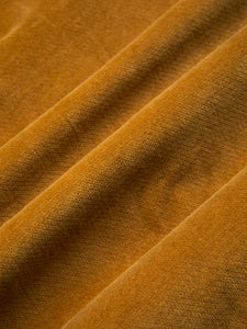 A warm yellow moleskin fabric, used to make a shirt by menswear brand KESTIN.