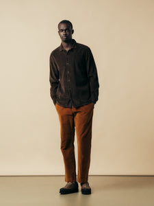 A model wearing a brown autumnal outfit made from corduroy and moleskin.