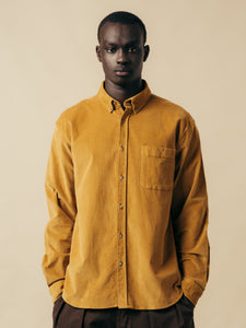 A man wearing a long sleeve shirt from KESTIN, in a yellow moleskin fabric.