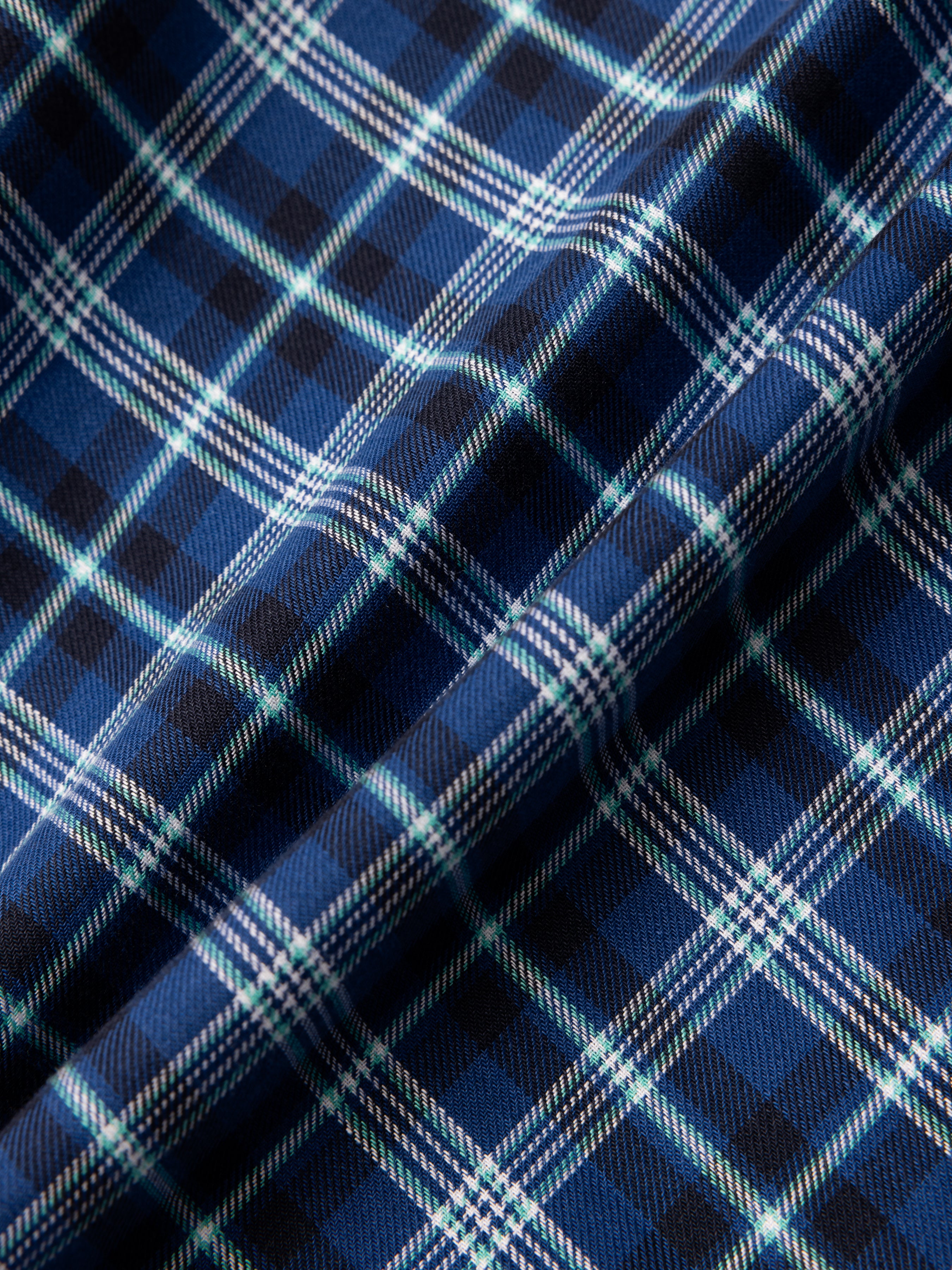 Close-up of blue and white plaid fabric