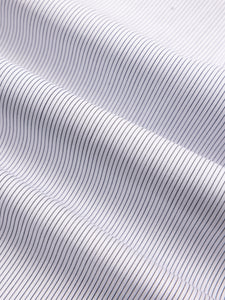 Close-up of white shirt fabric with thin blue stripes