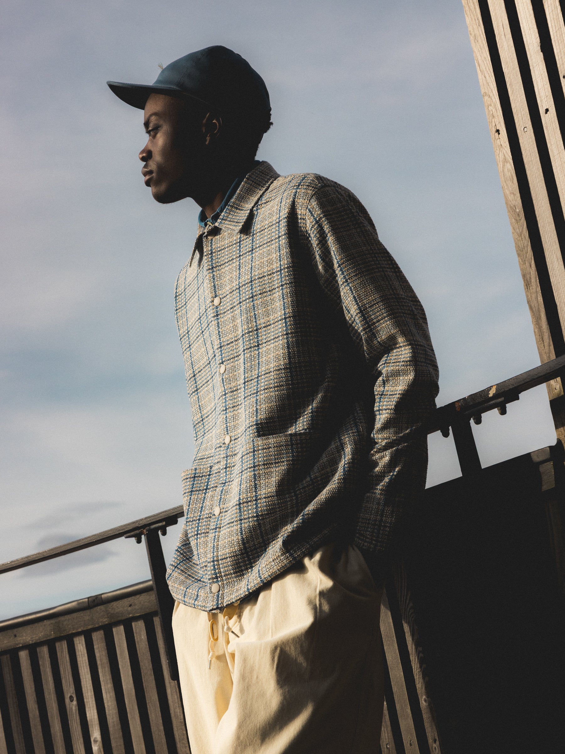 A man wearing a casual spring outfit from Scottish designer KESTIN.