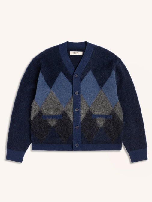 Navy blue cardigan with an argyle diamond pattern on a white background