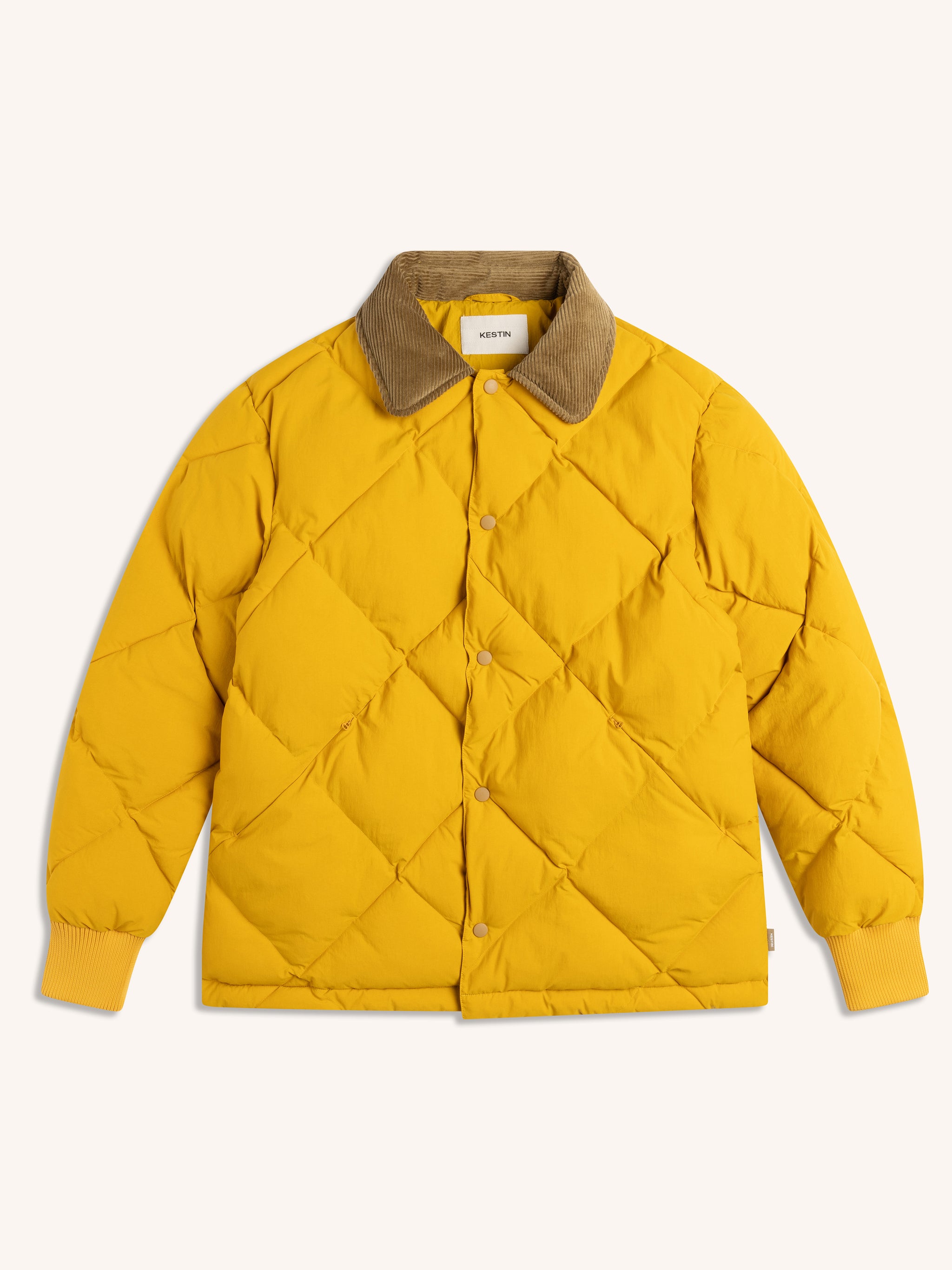 Yellow quilted jacket with brown collar on a white background