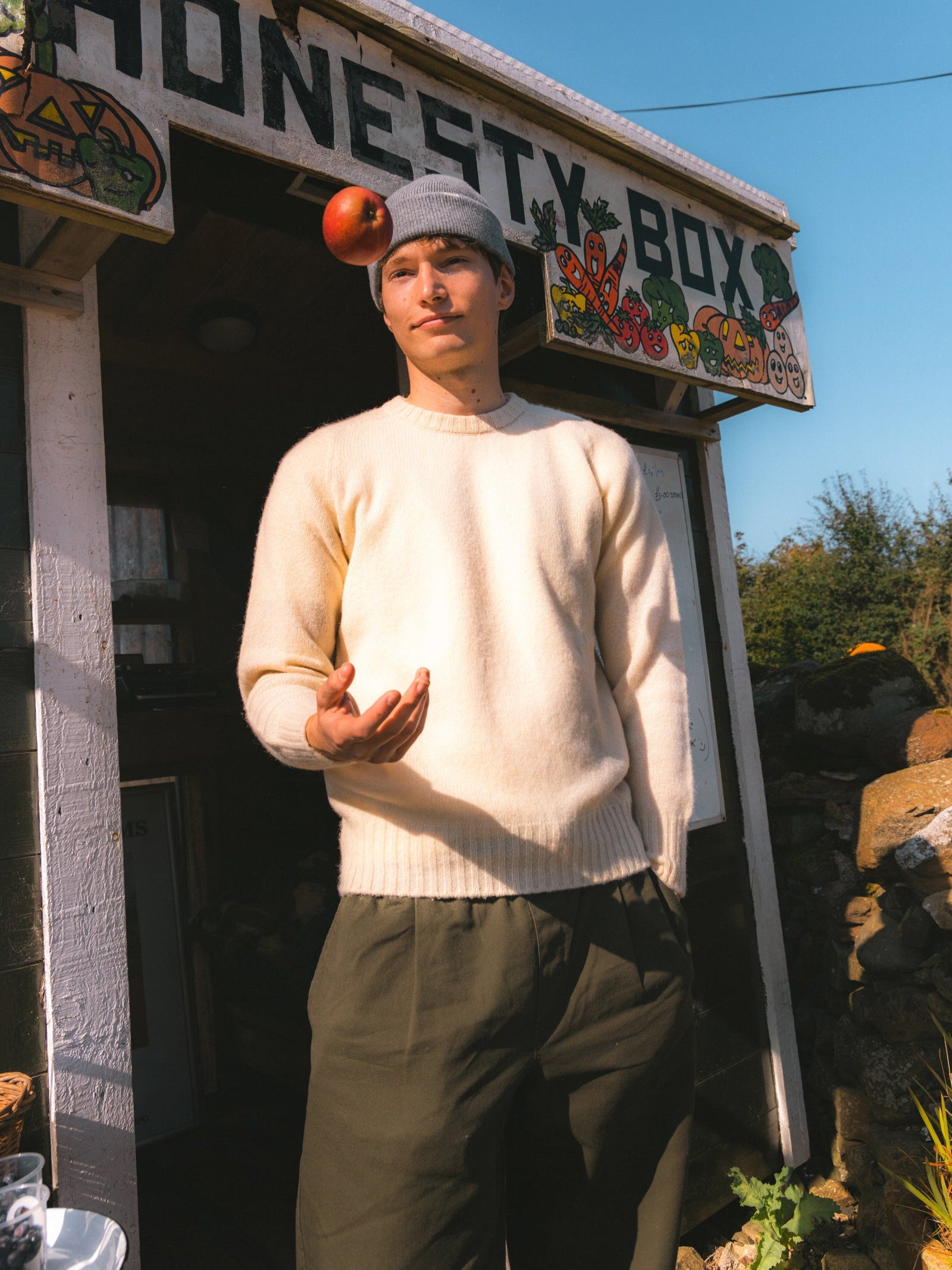 A model wearing a Shetland wool sweater, made in Scotland.