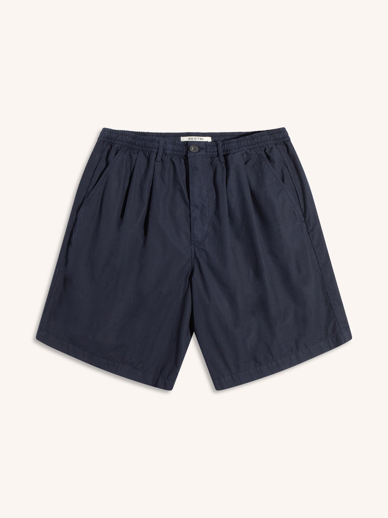 A pair of relaxed fit shorts in navy, on a white background.