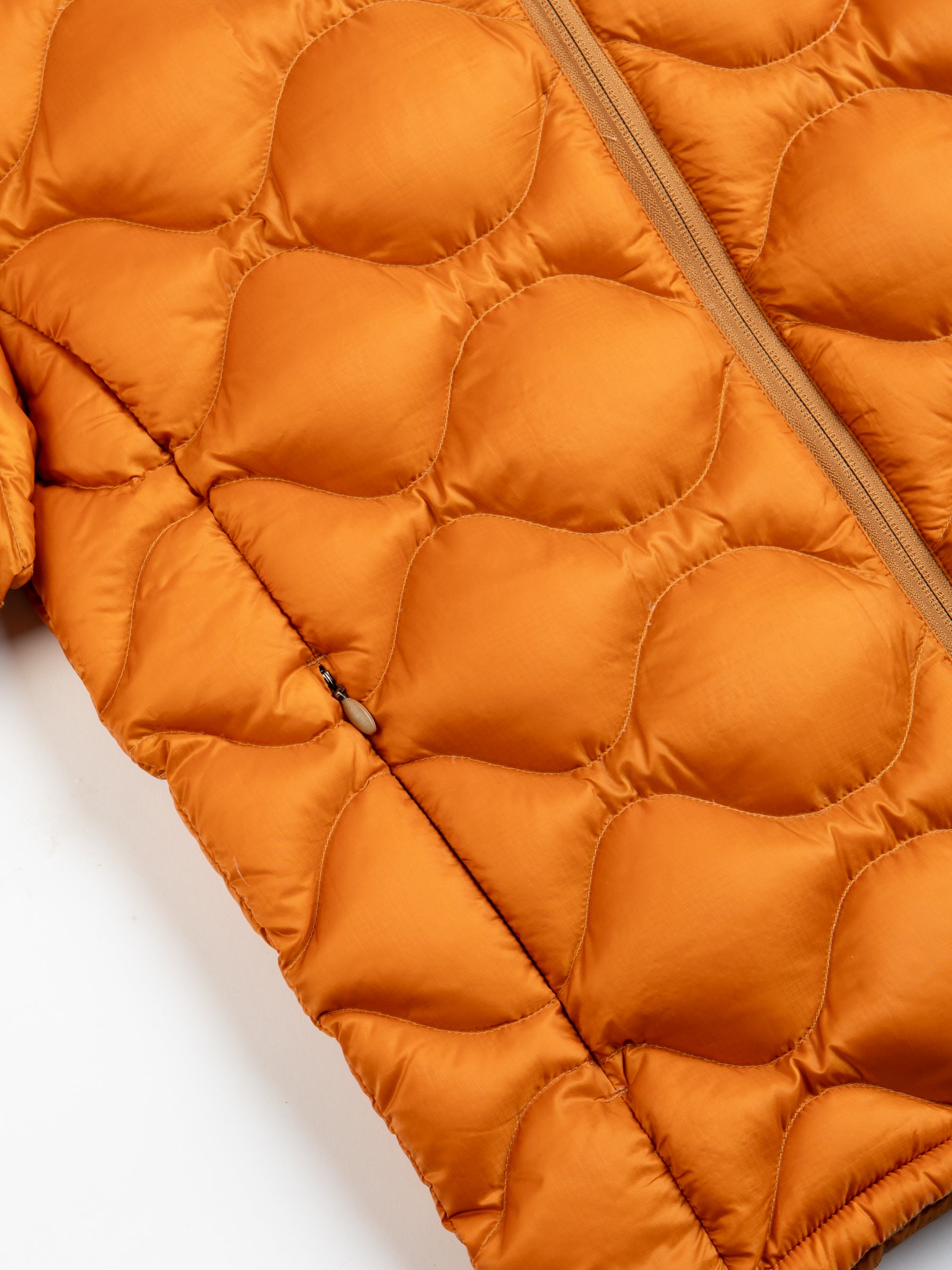 A subtle zippered pocket and quilted material from the KESTIN Cuillin Down Jacket.