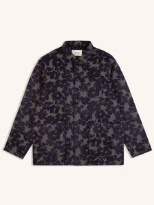 A navy blue jacket from Scottish menswear designer KESTIN, made from a floral Japanese fabric.