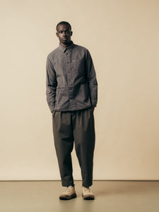 A model wearing a grey outfit from Scottish menswear designer KESTIN.