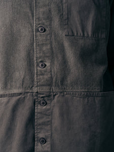 A close-up of the pockets of the Rosyth Overshirt in a twill and corduroy blend.