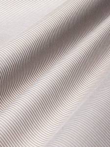 A white and brown hickory shirting fabric, used to make the Raeburn Button Down Shirt by KESTIN.
