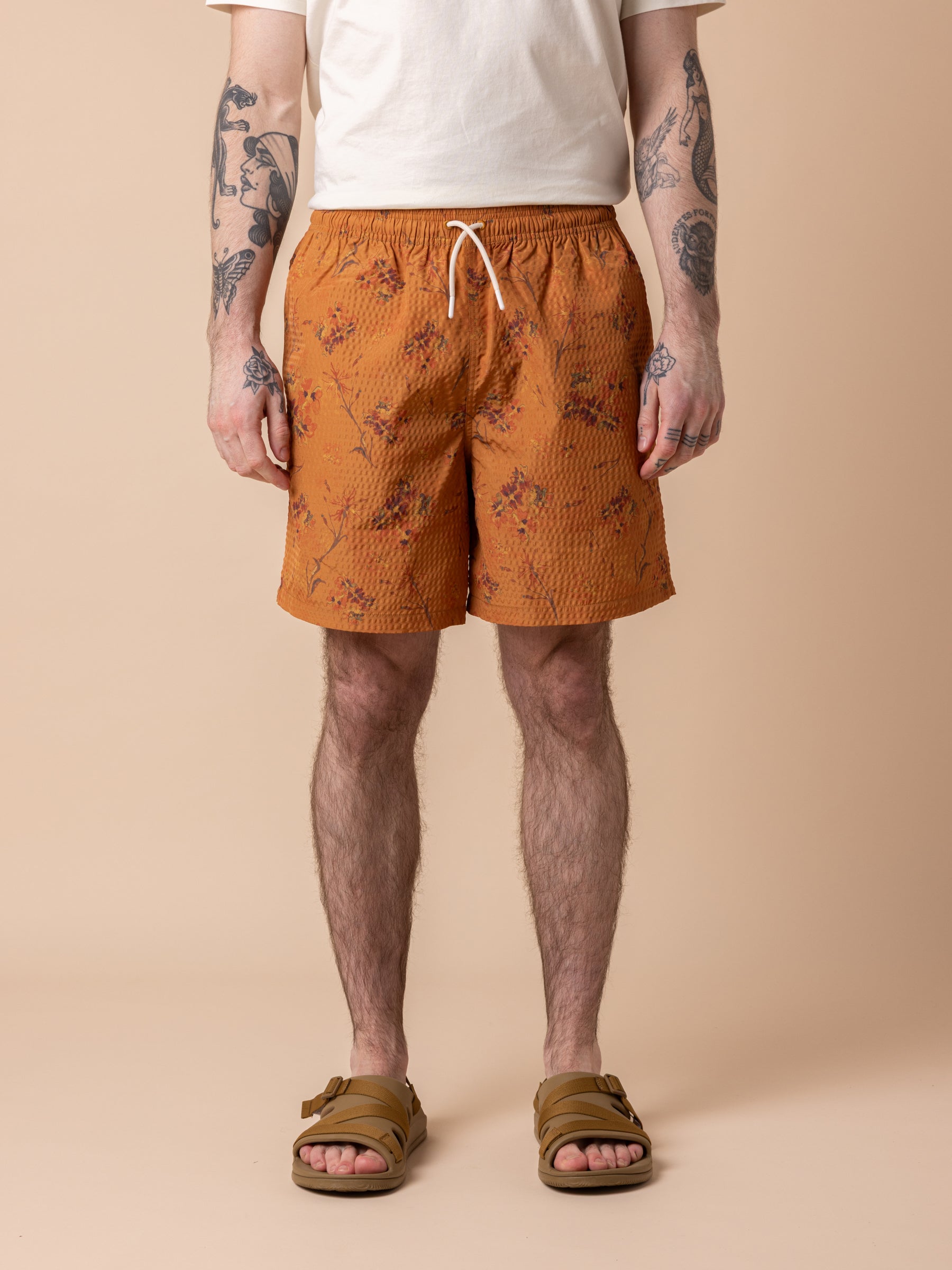 Seacliff Swim Shorts in Tangerine Floral SEAQUAL® Yarn