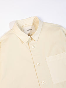 A close-up of the front and collar of the KESTIN Rosyth Overshirt in White.